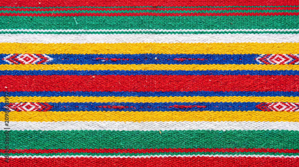 Obraz premium Colorful striped textile with traditional Mexican pattern.