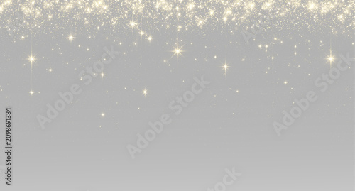 Golden glitter stars falling gold particles sparkling lights luxury festive decoration Christmas New Year glowing shimmer celebration