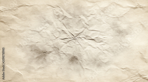 A textured, crumpled paper background, perfect for various design projects and artistic presentations.