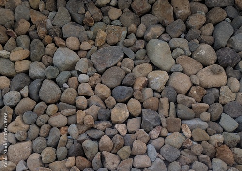 Canvas Print Natural river stones texture background high angle view