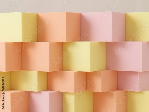Abstract background with many colorful 3d cubes in soft pastel yellow and orange colors arranged in a modern geometric pattern isolated on white background