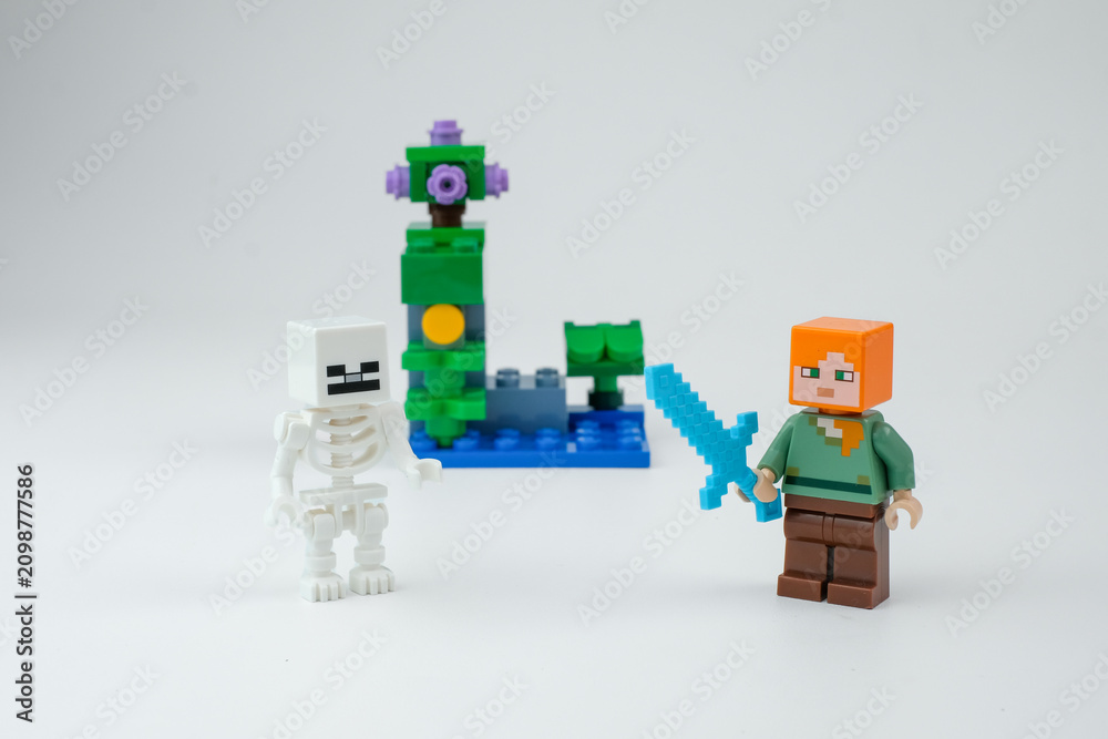 Obraz premium Minecraft-style block toy characters with a skeleton figure, sword, and fantasy structure are arranged on a white background on Apr 13, 2026 in Jakarta, Indonesia