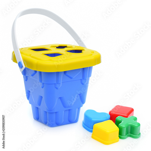Childrens educational shape sorter toy with bucket and colorful shapes, blue body
