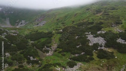 Flying Over Misty Mountain Landscape in Summer