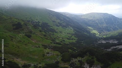 Aerial View of Green Mountain Valley Covered by Clouds