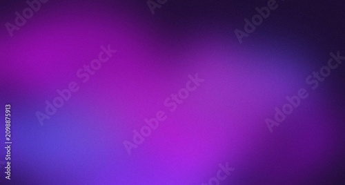 Vibrant purple and blue abstract gradient background with subtle grain texture. Smooth blurred color transition for modern design and digital projects.