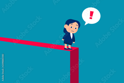 Businessman looking at a downward falling red neon arrow line graph on a dark wall, concept of stock market crash, economic recession and financial failure