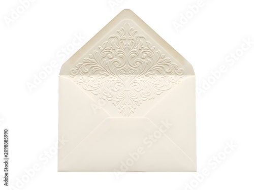 Cream colored paper envelope featuring a detailed embossed floral scrollwork pattern on the open flap isolated on a solid black background isolated on a transparent background