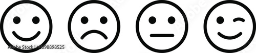 Fotografie Four simple black and white smiley face showing different emotions