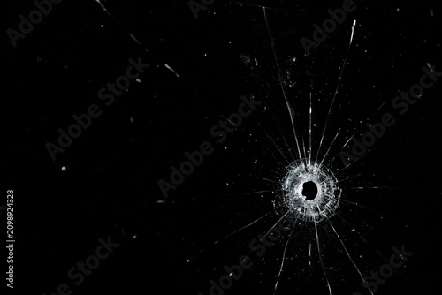 Bullet holes on black glass, overlay design background