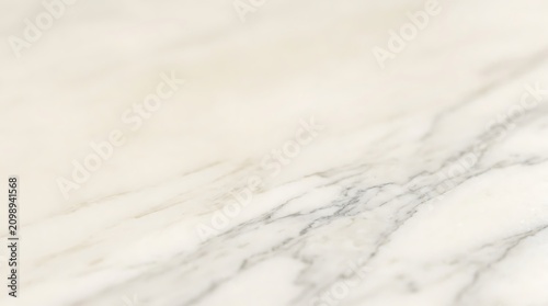 Soft white textured fabric background closeup.
