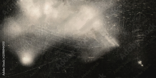 Фотография Soft glowing white light orbs and particles on dark backdrop with abstract backg