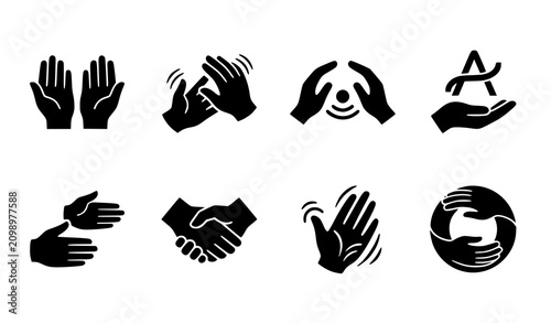 Interpreter accessibility hand symbols set with sign language, handshake, hearing, and communication gesture icons in black silhouette style