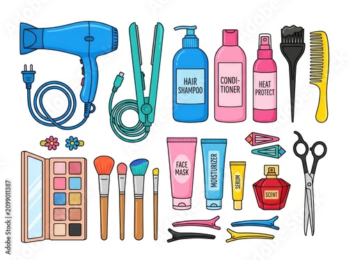 A collection of various beauty and hair care products displayed on a surface.