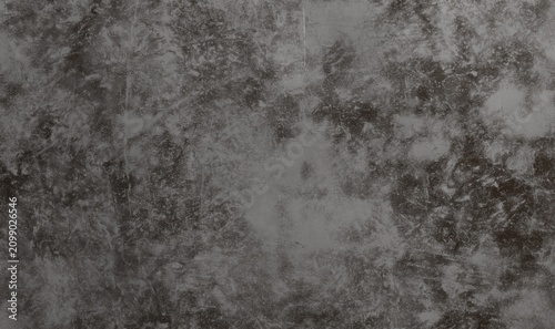 фотографія A grayscale abstract background with a textured, mottled appearance