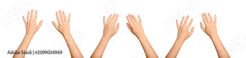 Two female hands stretching toward an unseen digital surface. Palms open as if engaging with virtual