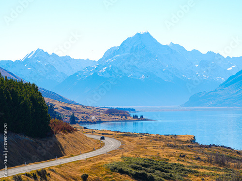 Konstfotografi Majestic autumn landscape of road leading towards Mount Cook Aoraki with Lake Pu