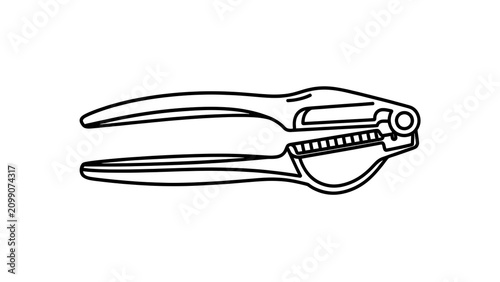 Garlic press tool on white background.