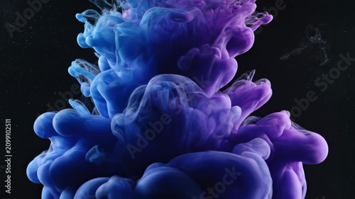 Colorful liquid shapes mix in water for art and design projects