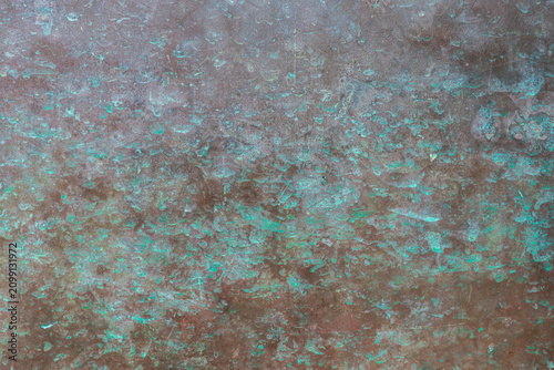 Obraz na płótnie Abstract macro texture of naturally weathered copper with subtle green patina