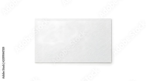 Rectangular object placed on a plain white surface in a room