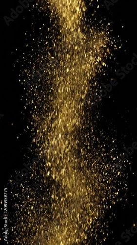 Golden shimmering bokeh particles falling in a soft festive loop on a dark background