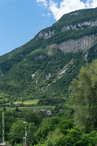 Photos Massive limestone escarpment above a small settlement near Lake Bourget in Savoie, France