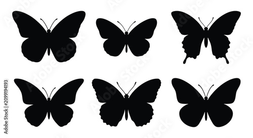 Cuadro en lienzo Butterfly silhouettes a collection of six black vector shapes on white