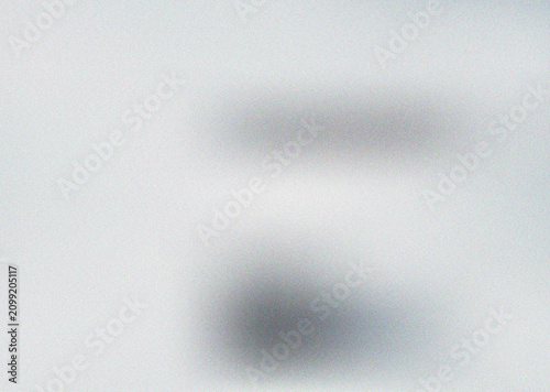 Clean light gray abstract gradient texture featuring soft blurred smudges and a distinctive grainy surface