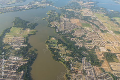 Texas Sprawl: High-Altitude Aerial View of Lewisville Lake and Surrounding Residential Subdivisions near Dallas, Texas