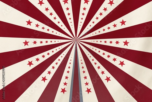 Symmetrical vintage red starburst radial background with converging stars for retro poster banner wallpaper and decorative circus design