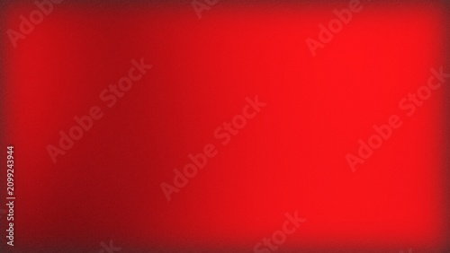 Abstract bright red background with dark vignette edges and soft light texture