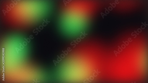 Abstract blurred background with soft glowing red and green circular light spots