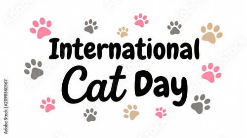 International cat day colorful paw prints celebration text