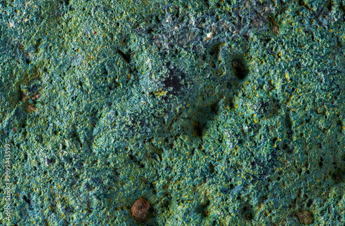 Quadro su tela Surface of rough stone with green and blue colors showing texture and details of