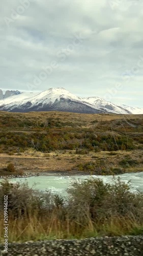 Cinematic view of mountains, rivers and pristine landscapes in Chilean Patagonia under daylight. Untouched wilderness with dramatic peaks, valleys and natural scenery in southern Chile.
