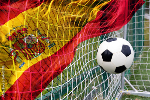 Soccer ball and the flag of Spain