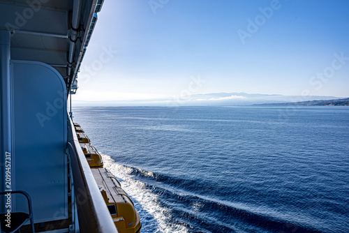 Cruise Ship Sailing Along the Coast