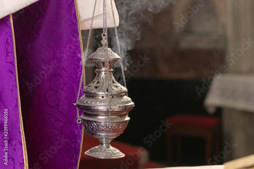 Schilderij op canvas A Catholic priest leads Holy Mass in a historic church in Europe