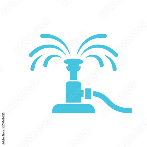 Garden sprinkler spraying water connected to a hose