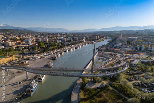 Bild auf Leinwand An aerial view of the Ponte del Mare footbridge stretching across the Pescara Ri