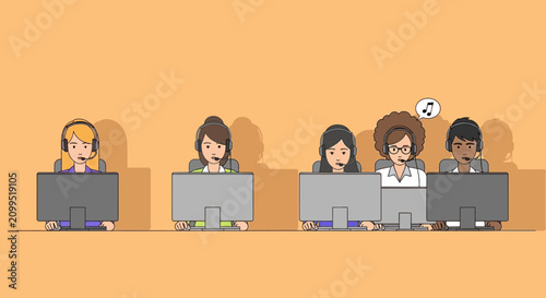 Diverse group of people working on computers.