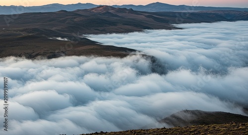 Mountain landscape above the clouds.