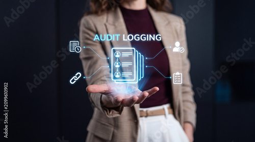 Businesswoman Holding Blue Audit Logging Hologram