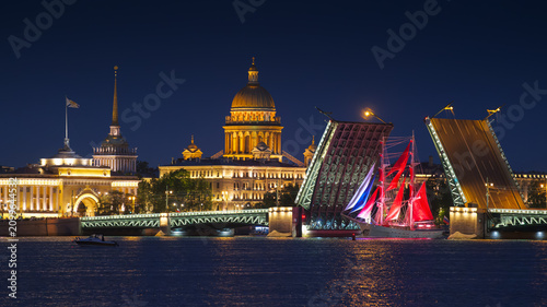 Fotografie Saint-Petersburg, Russia - June 12, 2026, panoramic view of Neva River with a ship with scarlet sails, with Palace Bridge, St