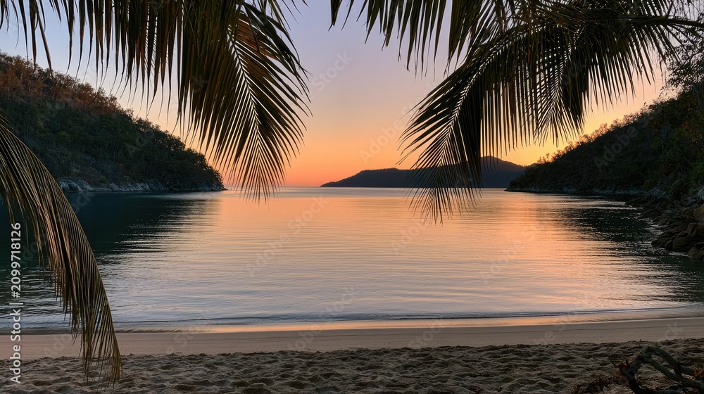Obraz premium Serene cove at twilight, framed by palm fronds, calm waters glow warm
