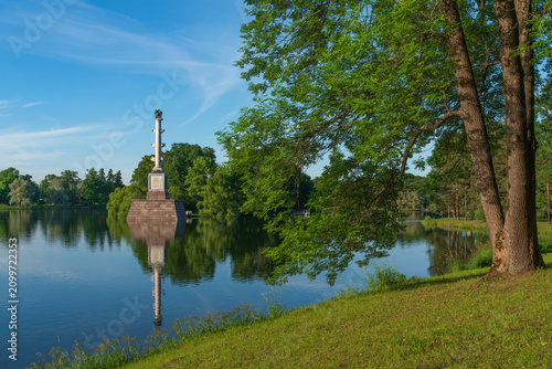 The Chesme Column in the center of the Great Pond in the Catherine Park of Tsarskoye Selo on a sunny summer day, Pushkin, Saint Petersburg, Russia