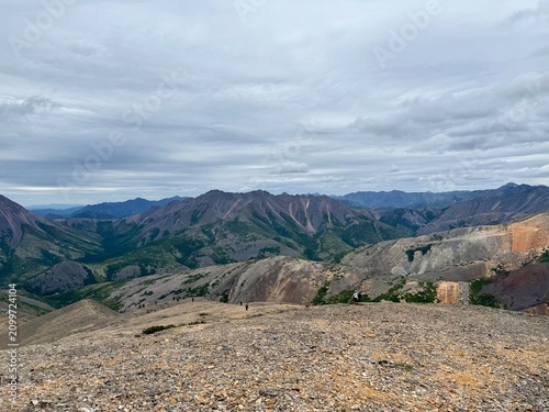 Expansive mountain landscape with dramatic peaks, valleys, and alpine terrain un
