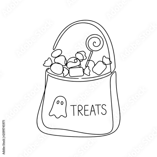 Trick-or-treat bag filled with candy and colorful sweets  