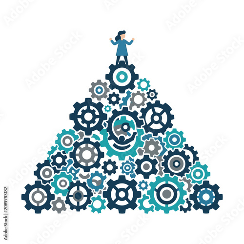 Businessman standing on gear pyramid structure.
